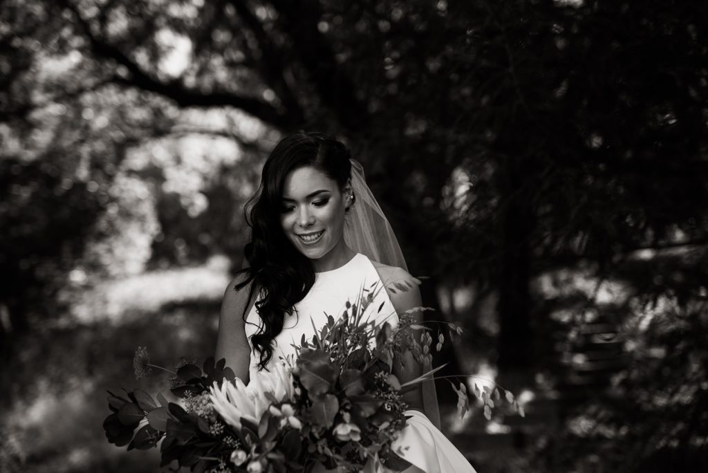 moody black and white portrait of modern bride
