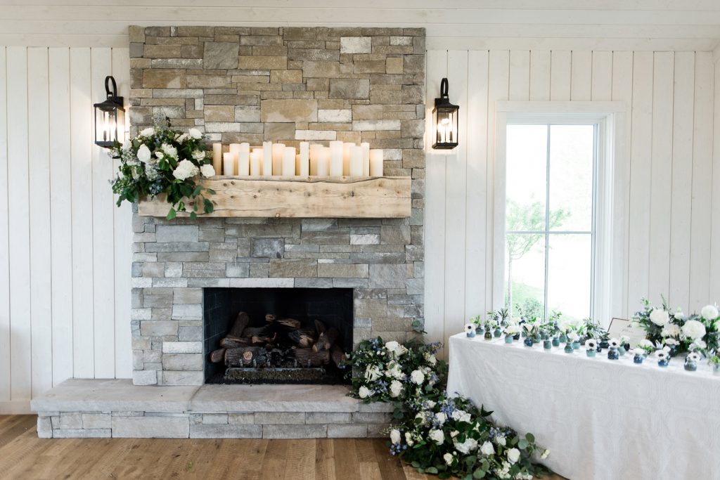 Fireplace Floral Arrangement by Artisan Bloom